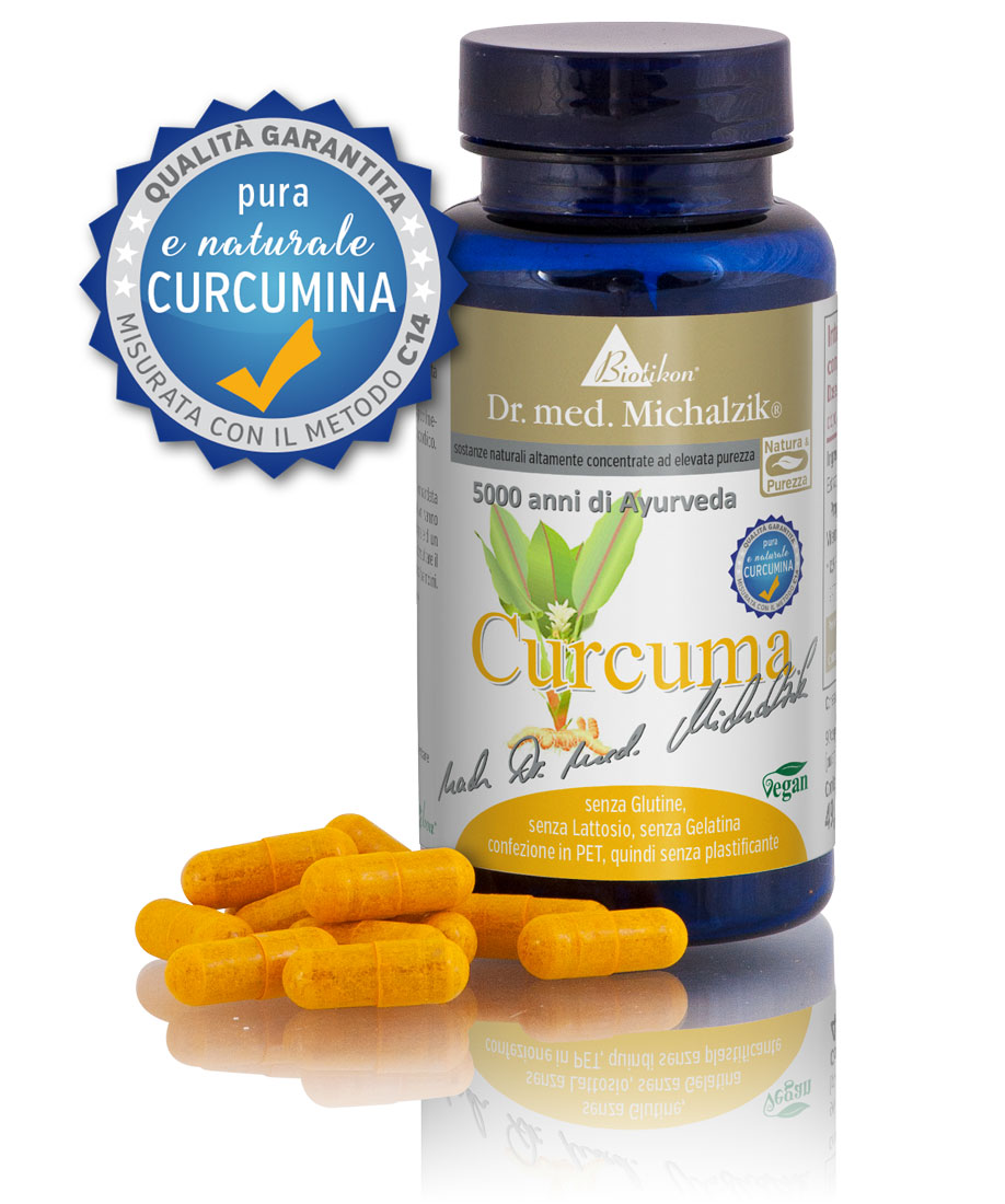 Polvere di Curcuma 500 mg - Capsule Capsule gialle con polvere di curcuma in una bottiglia blu, vegane, senza glutine.