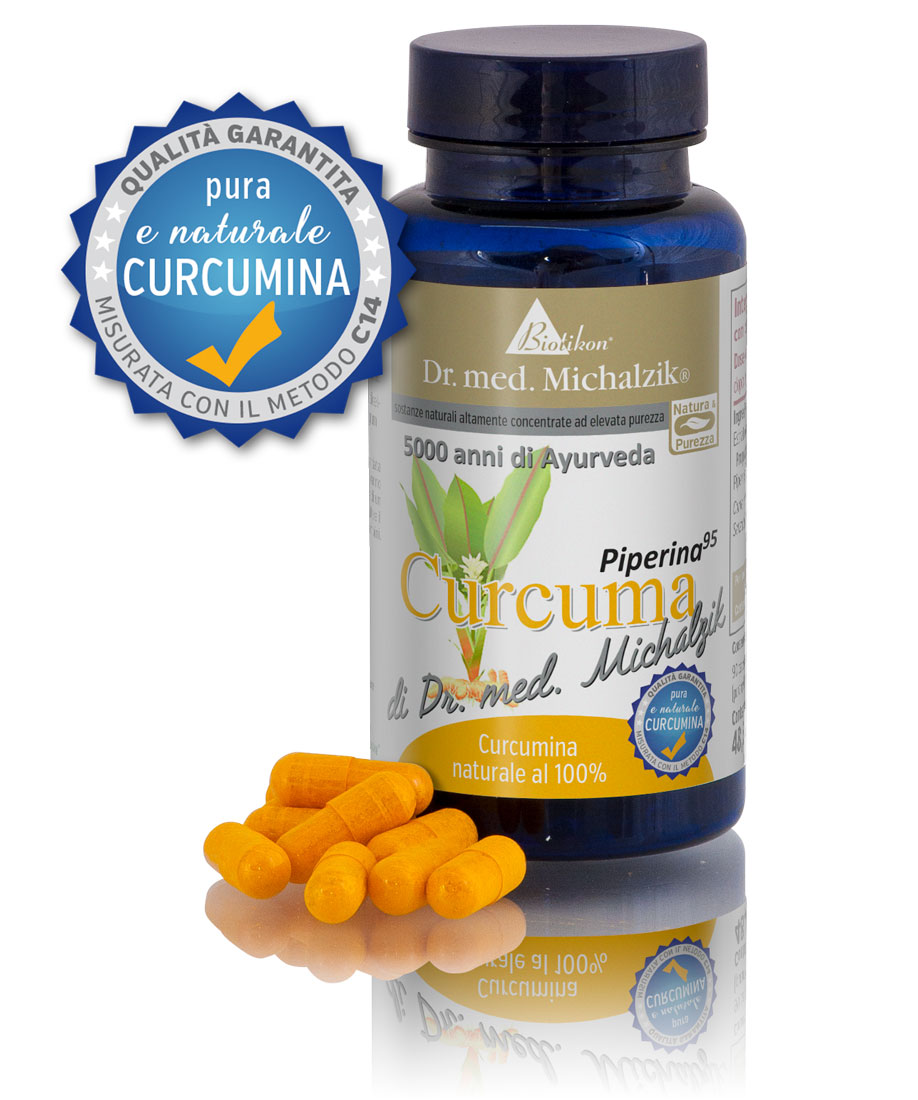 Curcuma 500 mg – Capsule Capsule con curcuma e piperina, di colore arancione, in una bottiglia blu, vista frontale.