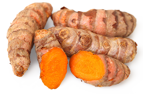 Radice di Curcuma – 500 g Radici di curcuma fresche, fette arancioni, su sfondo bianco.