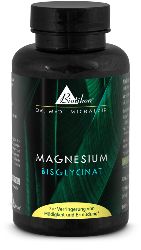 Bisglicinato di magnesio – 120 capsule Bottiglia di capsule nere contenente bisglicinato di magnesio, 120 pezzi, con foglie verdi sullo sfondo.